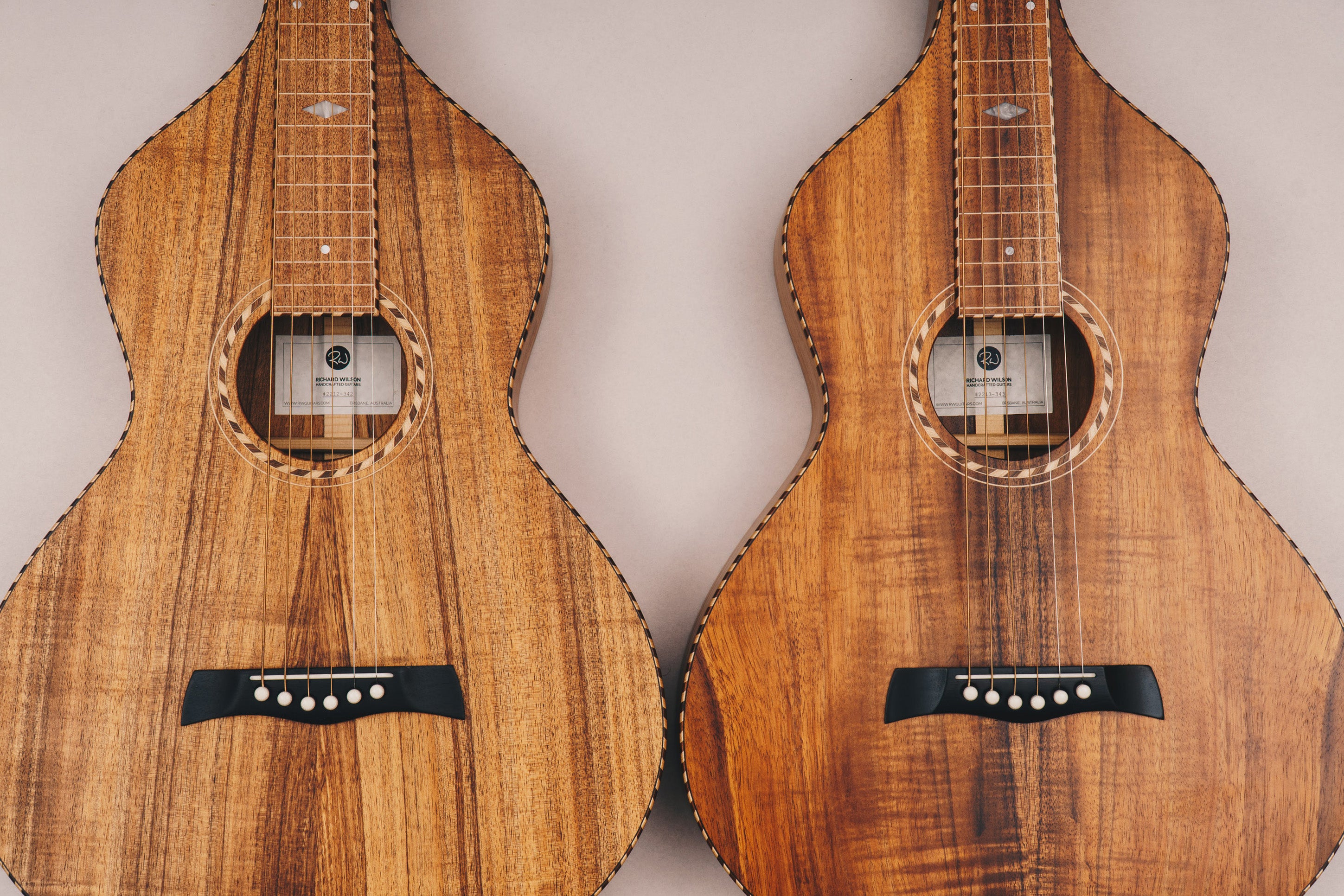 Two Style 3 Weissenborn guitars crafted by Richard Wilson. Left: Tasmanian Blackwood. Right: Hawaiian Koa.