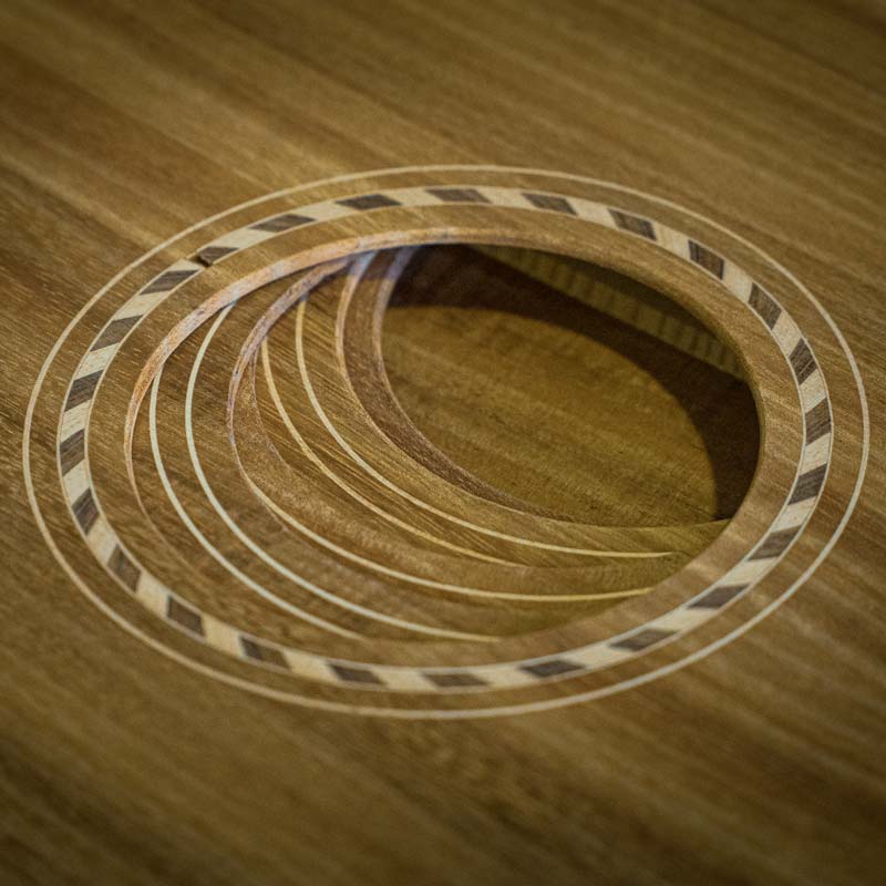 Weissenborn guitars with soundhole rosettes installed.