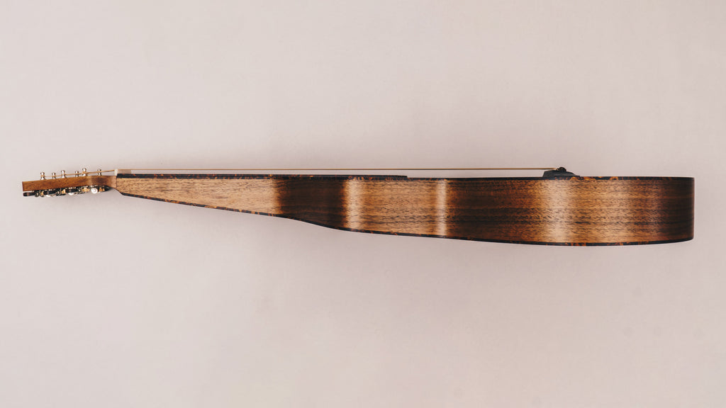 Style 2 Weissenborn guitar featuring tortoiseshell binding, tuning machines and bridge pins by Richard Wilson.